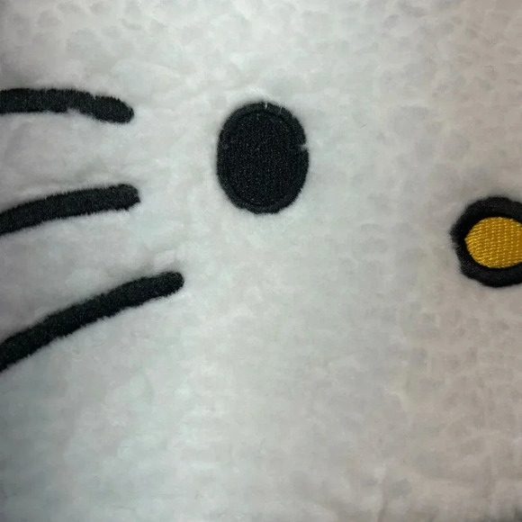 White hello Kitty hat, Sherpa outside red bow, braided tassels on the side - Picture 3 of 5